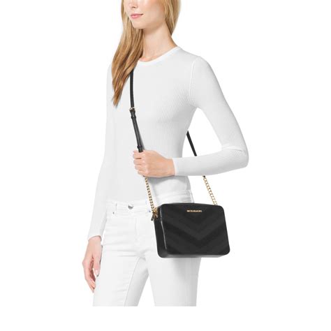 michael kors jet set travel signature large phone crossbody|michael kors phone wallet crossbody.